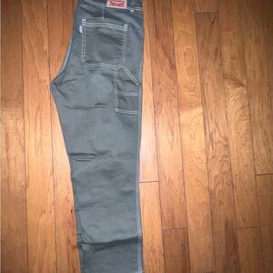 Olive green Levi cargo looking jeans